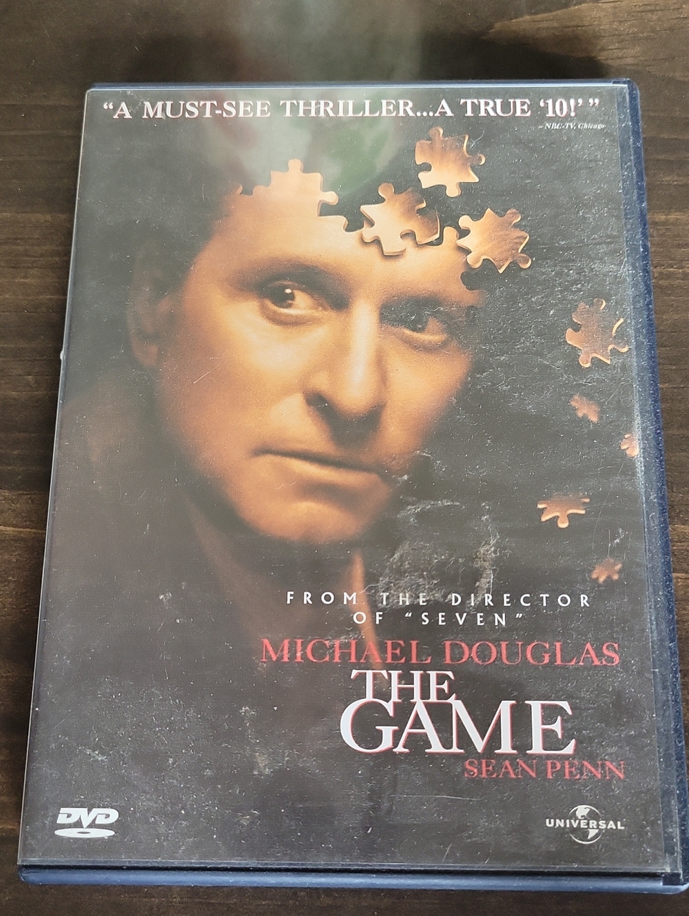 Universal DVD The Game — Black and Brown Puzzle Cover